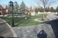 Residential Backyard Fun Space With GolfGreens Putting Green