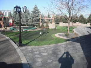 Residential Backyard Fun Space With GolfGreens Putting Green