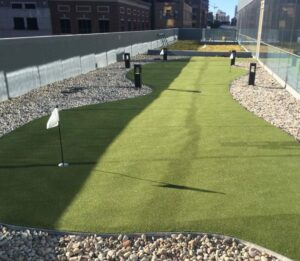 Chicago outdoor balcony space with a GolfGreens putting green installed by ForeverLawn Chicago