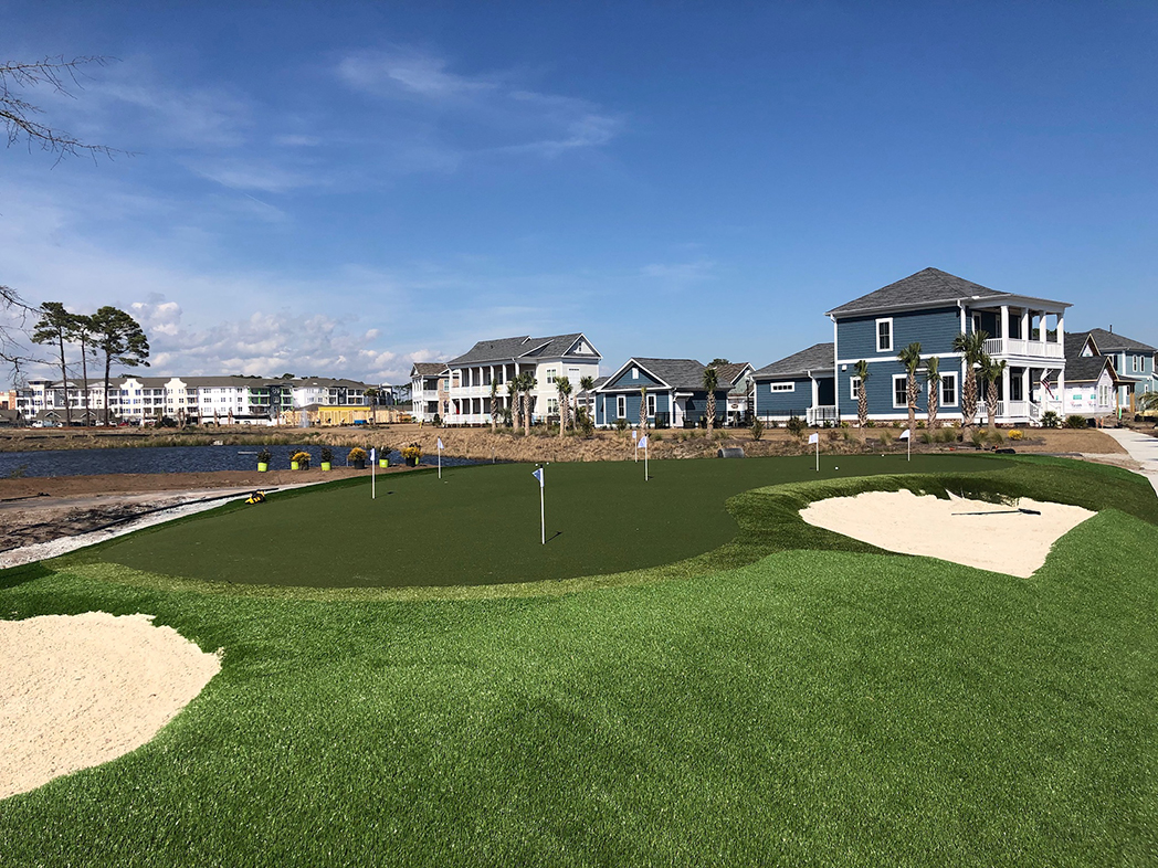 Putting green featuring GolfGreens® Pro Putt & Chip, Fringe, and DuPont™ ForeverLawn® Select HD at Living Dunes residential community in Myrtle Beach, SC