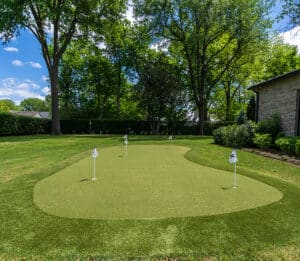 Backyard putting green in Tulsa, OK, featuring GolfGreens synthetic turf installed by ForeverLawn Tulsa