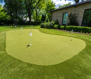 Backyard putting green in Tulsa, OK, featuring GolfGreens synthetic turf installed by ForeverLawn Tulsa